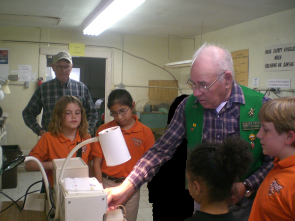Harold Ervin shows Troop 92 the use of a Genii
