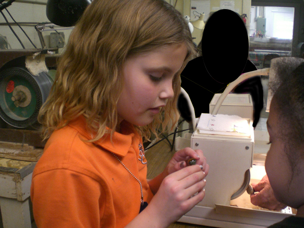 Troop 92 member studies her cab